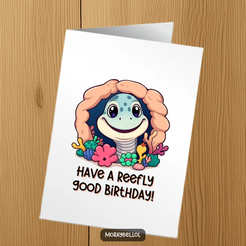 Funny Free Printable Birthday Card featuring a grinning moray eel peeking mischievously from a colorful coral reef.