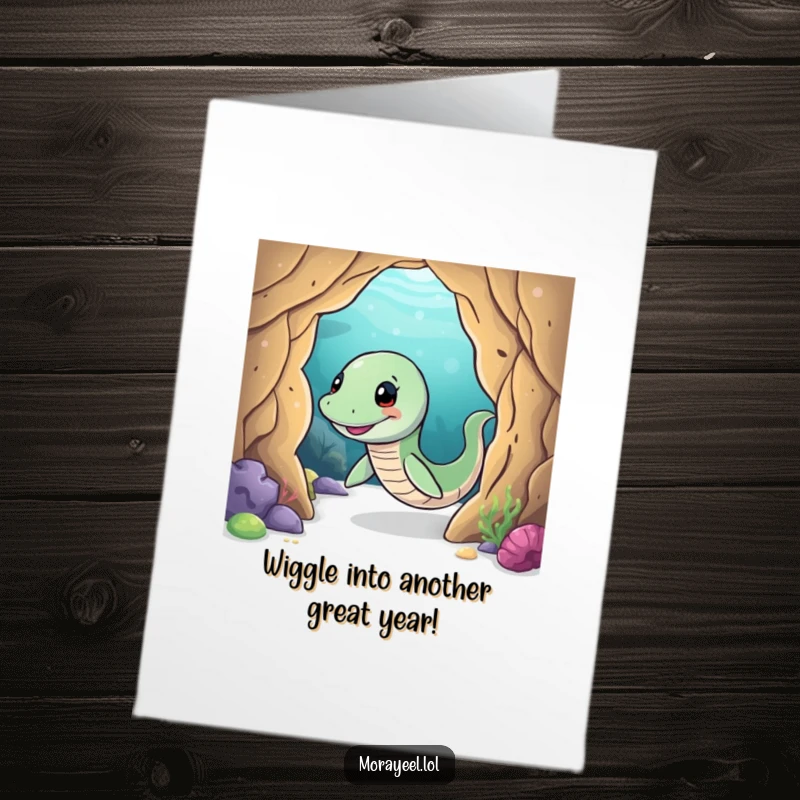 Free Printable Birthday Card featuring a smiling moray eel character playfully wiggling through a mysterious underwater cave.
